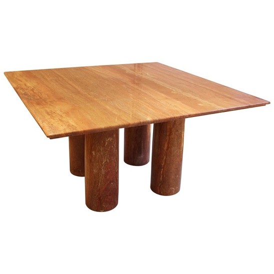 Dining table in red travertine 'Il collonato' by Mario Bellini