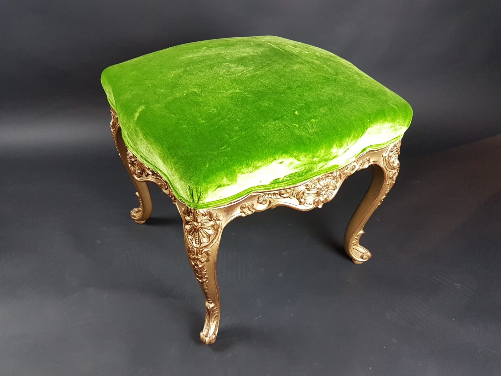 Pair of Louis XV style stools in gilded wood, early 20th