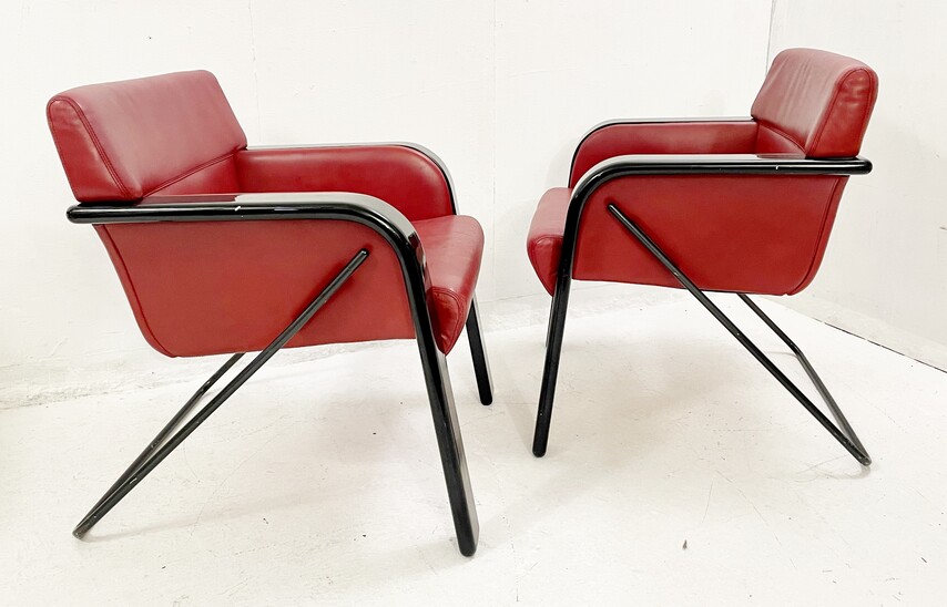 Pair of mid-century red leather armchairs by Claudio Salocchi for Rossi di Albizzate - Italy 1970s