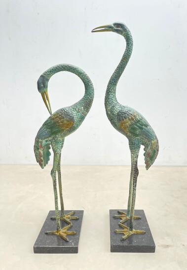 Pair of patinated bronze heron