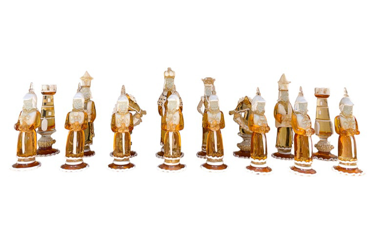 Rare Chess Set Composed of 32 Solid Amber Glass Pieces, finished in white or black pâte de verre, with gold leaf decoration, Barbini,Pauly & C, Murano, 1930s