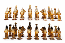 Rare Chess Set Composed of 32 Solid Amber Glass Pieces, finished in white or black pâte de verre, with gold leaf decoration, Barbini,Pauly & C, Murano, 1930s