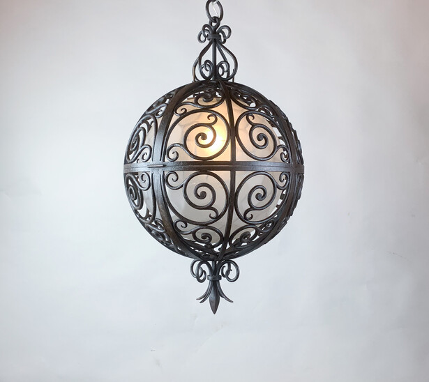 Wrought iron round suspension with interior glass sphere - c.1930